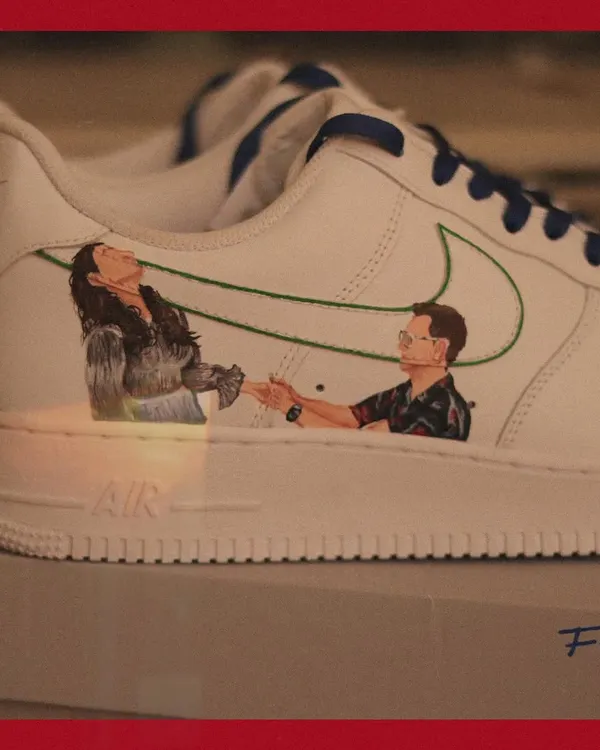 Love is in the Air. I created this custom set for a couple, painting their portraits on one pair of Nike Air Force 1s and their initials on a matching pair of Nike Blazers.