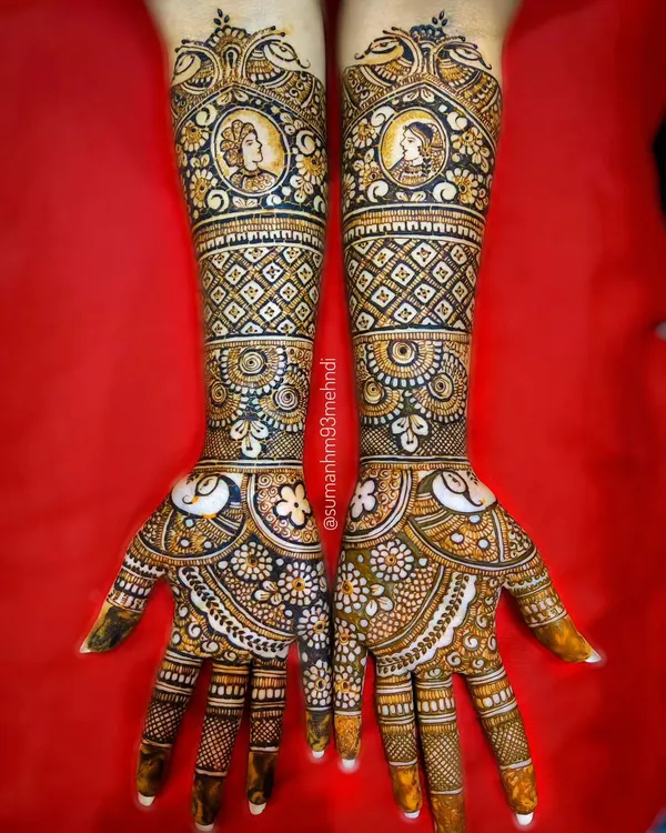 This is what a complete bridal story looks like. I've captured the bride and groom in traditional attire, framed by intricate patterns that extend up the full arm. This design is a testament to my detailed portrait work and my passion for creating unforgettable wedding henna.