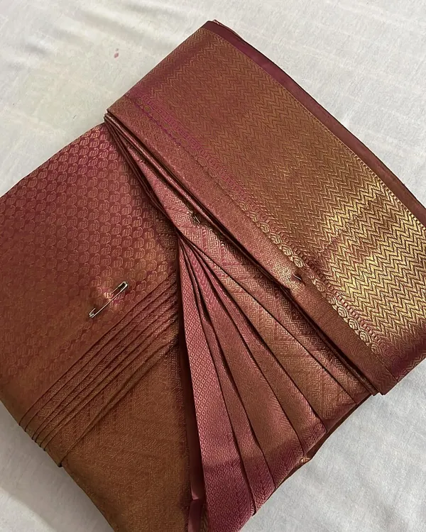 This is the result I aim for with every saree. The pleats are perfectly set, ironed, and pinned, making it incredibly easy for you to drape. This rich silk saree is now ready for any grand occasion, completely stress-free.