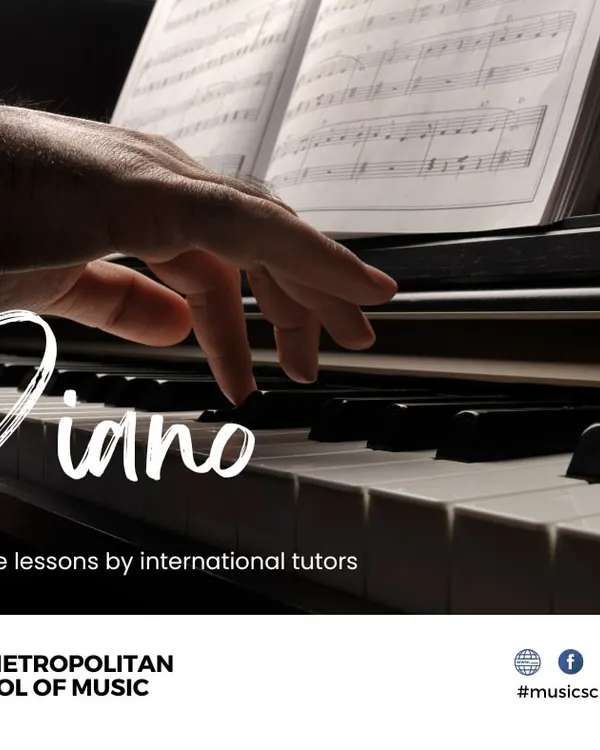 Our piano program features private lessons with international tutors. This close-up shows the focus on proper hand posture and technique while reading sheet music, which is essential for classical piano training.