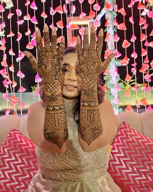 A happy bride is the best review. Here she is, glowing in her full bridal mehndi, ready for her big day.