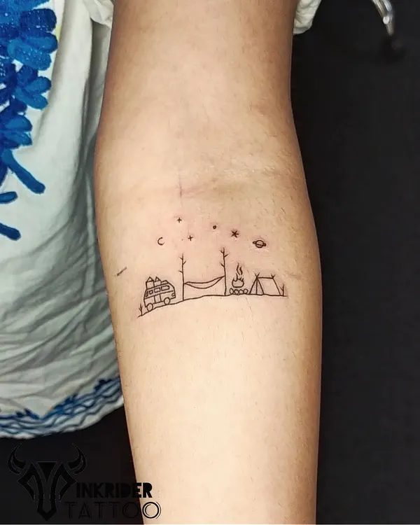 A tiny, single-line camping scene that tells a big story of adventure. This minimalist tattoo captures the joy of the outdoors, complete with a van, hammock, and campfire under the stars.