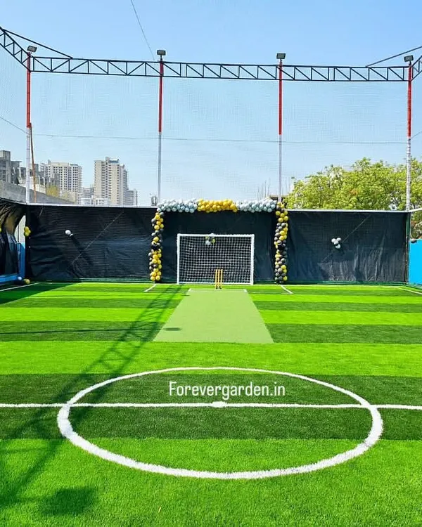 A professional multi-sport turf installation, featuring clear line markings for both football and cricket on vibrant, durable artificial grass.