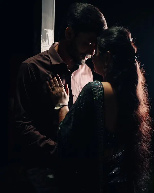 **(Hero Item)** This is the kind of cinematic portrait I love to create. I focus on raw emotion and use dramatic lighting to capture the connection between two people. It’s more than a photo; it’s a moment that feels like a scene from a film.