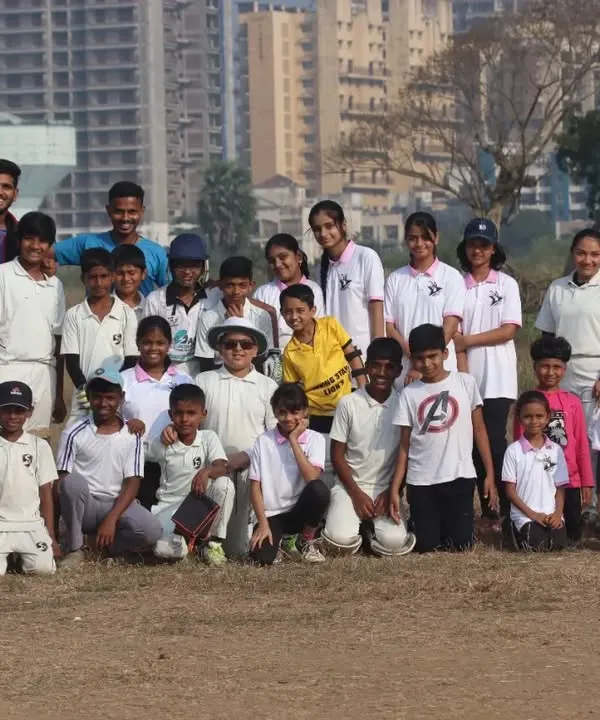 This is our family. We train boys and girls together, building a strong community of young cricketers who support each other on and off the field.