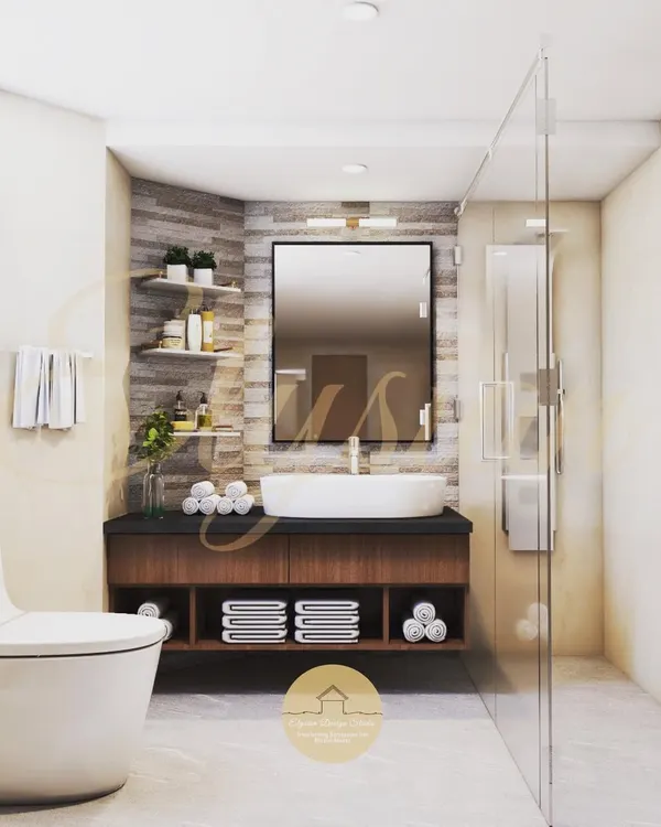 A luxurious bathroom should be a standard, not an afterthought. This design features a floating vanity, a large mirror, and a glass shower partition, with textured tiles on the accent wall to add character.