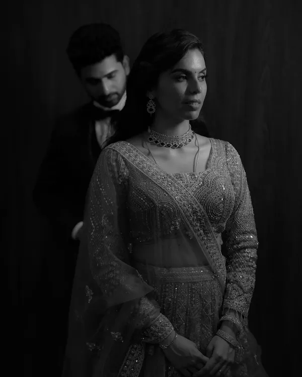 A classic black and white portrait that feels like a still from a vintage film, full of elegance and emotion.