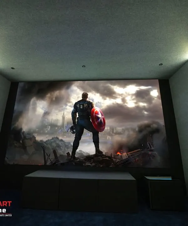 A view of the massive screen in our Madurai project, showcasing the incredible detail and scale of a 4K projection. The minimalist design ensures there are no distractions from the on-screen action.