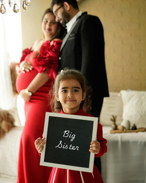 There is nothing sweeter than a promotion to big sister. We love including siblings in our sessions to capture these precious family moments.