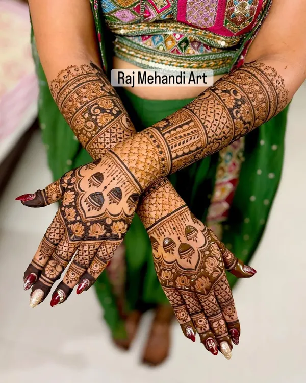 A showcase of my full-coverage Rajasthani bridal mehndi. This design features extremely fine lines, traditional motifs, and a balanced composition that extends beautifully from the fingers to the forearms.