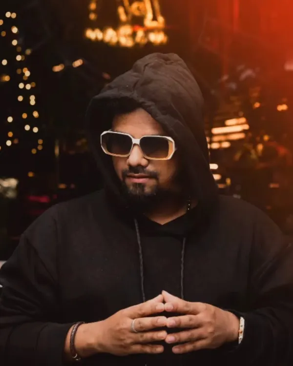 A shot that captures my professional style and persona. I bring not just the sound, but a confident and stylish presence to every event I play.