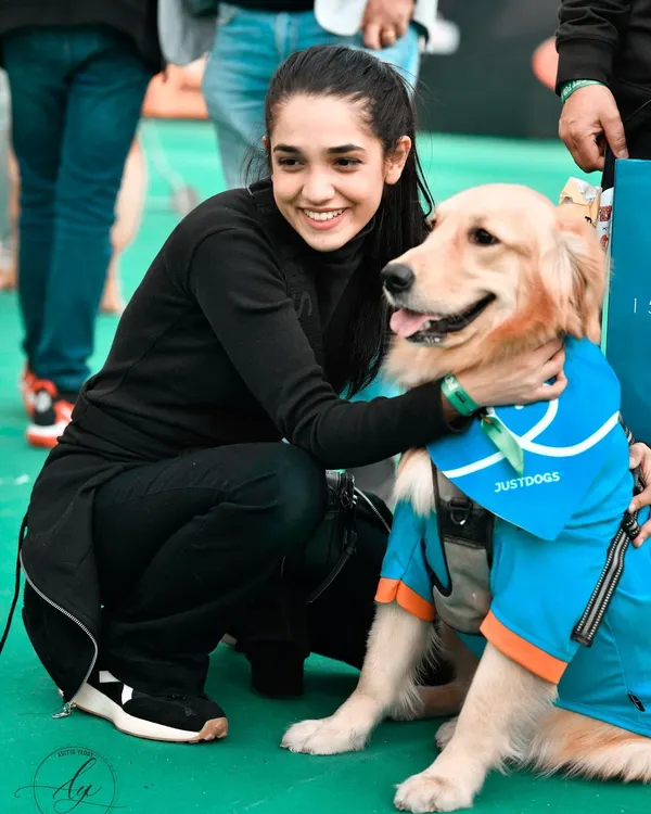 A golden companion for a golden life. This beautiful Golden Retriever and his owner shared such a gentle moment at the pet festival. It’s my job to find these quiet connections even when there's a lot going on around us.