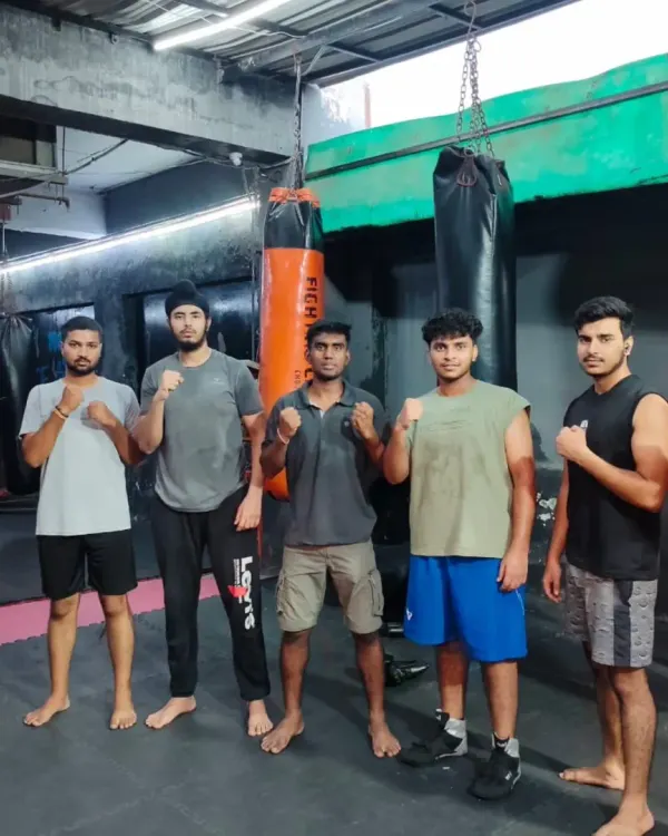 A group of our members after a tough self-defense class. We are a diverse crew, united by the goal of becoming stronger and more confident.