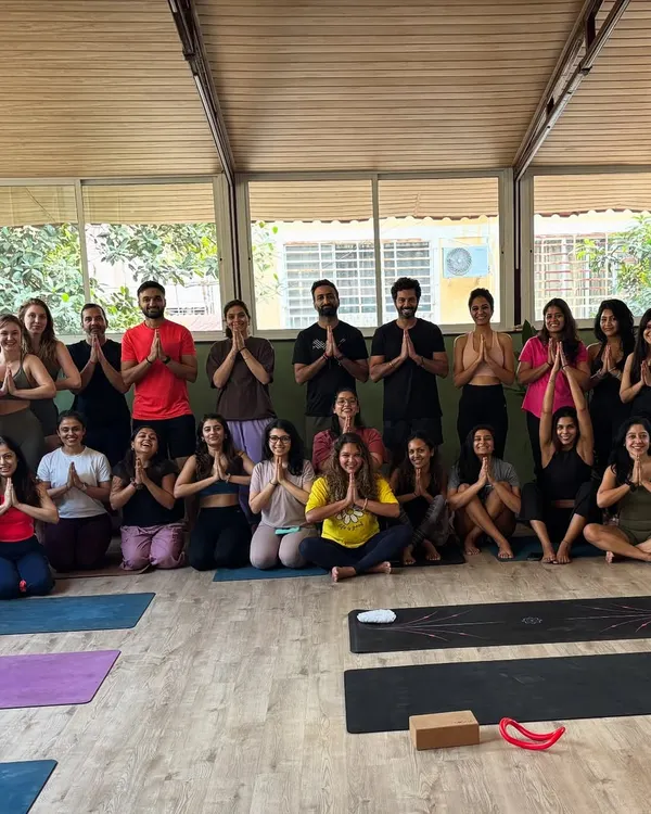 Our community in a moment of gratitude after a class. We start and end our practice together, fostering a sense of unity.