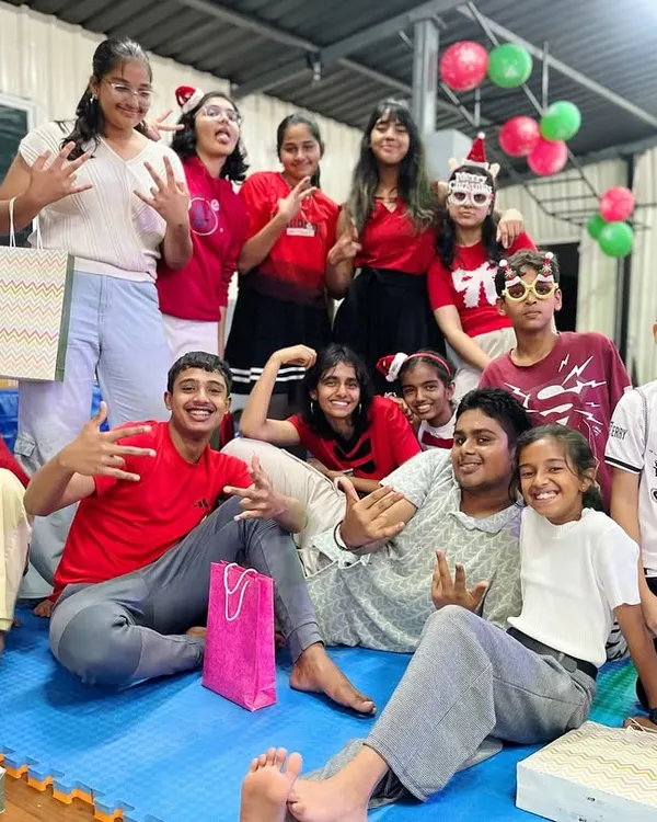 The whole crew together for a Christmas celebration. We believe in creating a strong community, and our parties are all about fun, friendship, and making memories.