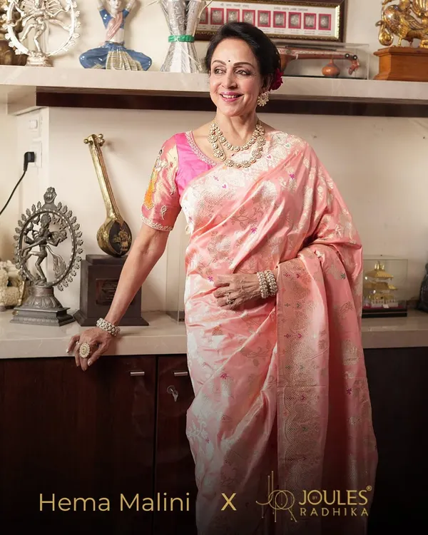 The legendary Hema Malini, an icon of timeless grace, wearing a classic polki diamond necklace and bangle set. A true honor to adorn a star of her legacy.