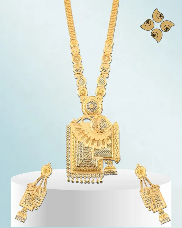 Designed to enchant, this long gold necklace set features a large, geometric pendant and matching earrings. The intricate machine-cut detailing makes it a modern luxury piece that is built to last.