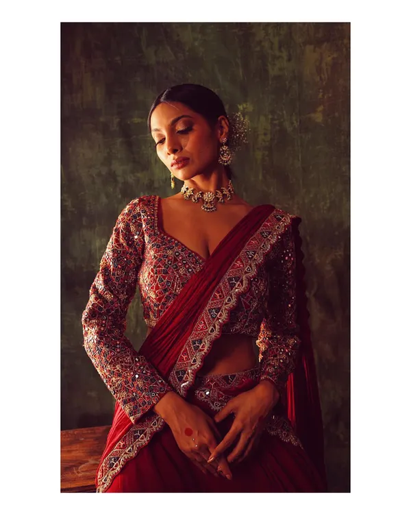 This is the ultimate classic bridal look. I styled this rich, red lehenga with intricate full-sleeve embroidery and a delicate choker to create a regal and timeless statement for the main wedding ceremony.