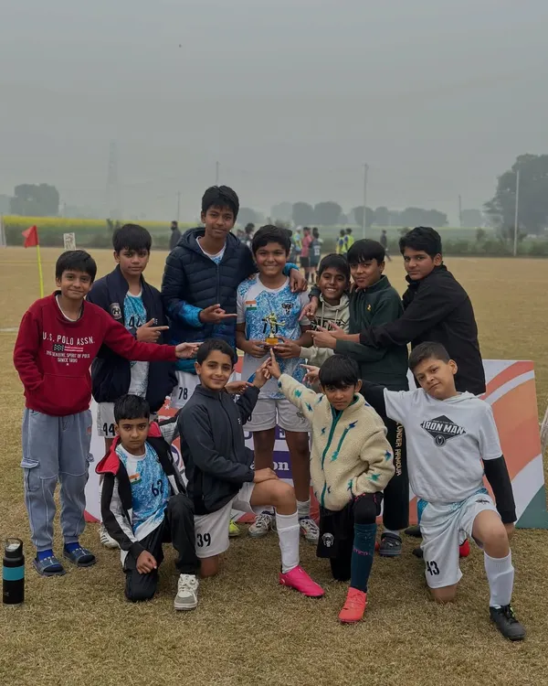 Our U-14 stars celebrating with their tournament trophy. Early success builds a winning mentality for the future.