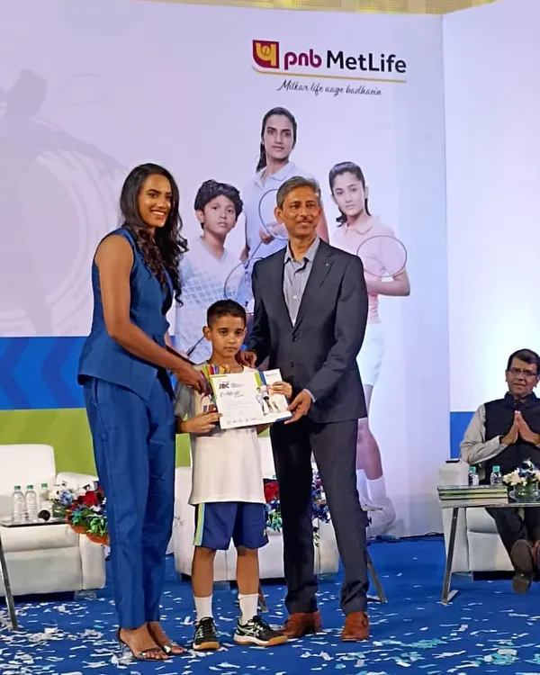 This is what high-level competition looks like. Here is one of our young champions from the Rohini academy receiving his award from the one and only PV Sindhu at the PNB MetLife Junior Badminton Championship. This is the level we push for.