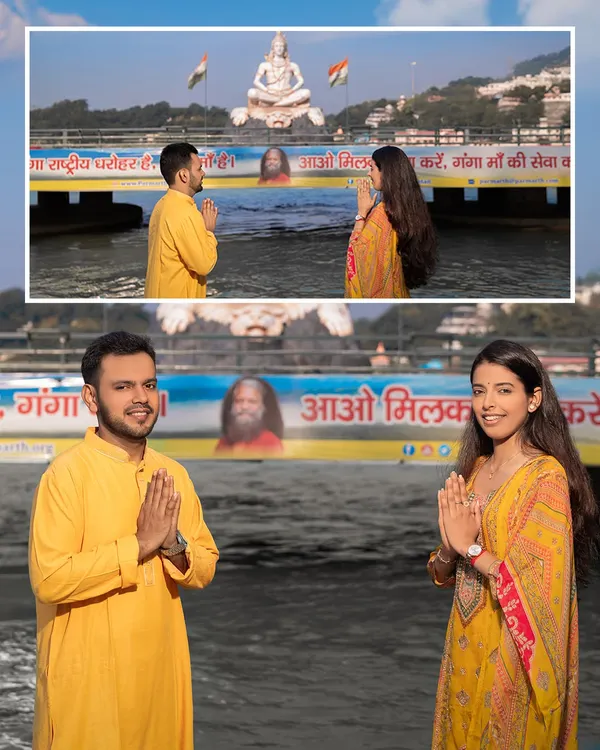 With the magnificent Shiva statue in the background, the couple offers a prayer with folded hands. This shot beautifully merges their spiritual journey with their journey as a couple, captured at the Ganga.
