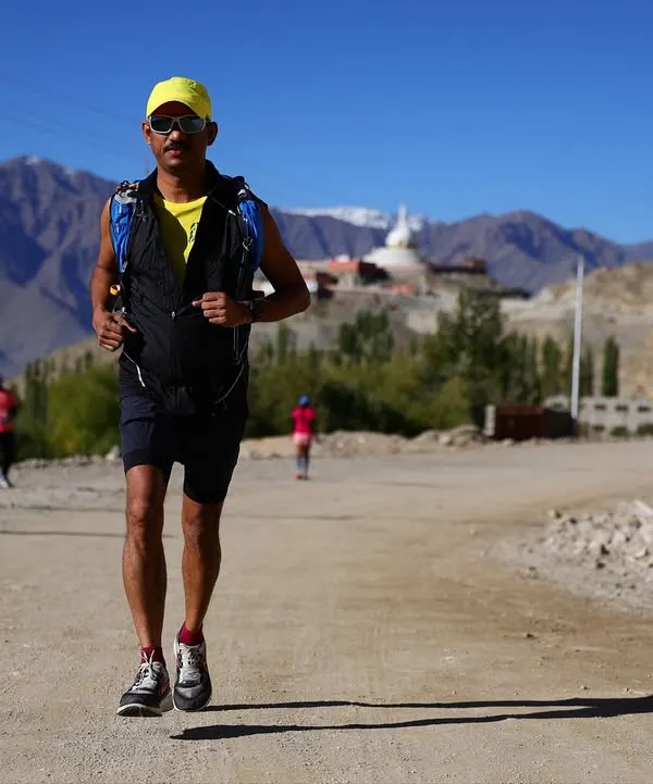 Here I am during a training run for the Ladakh Marathon, fully equipped for the high-altitude challenge. I coach and run with my team to ensure everyone is prepared.
