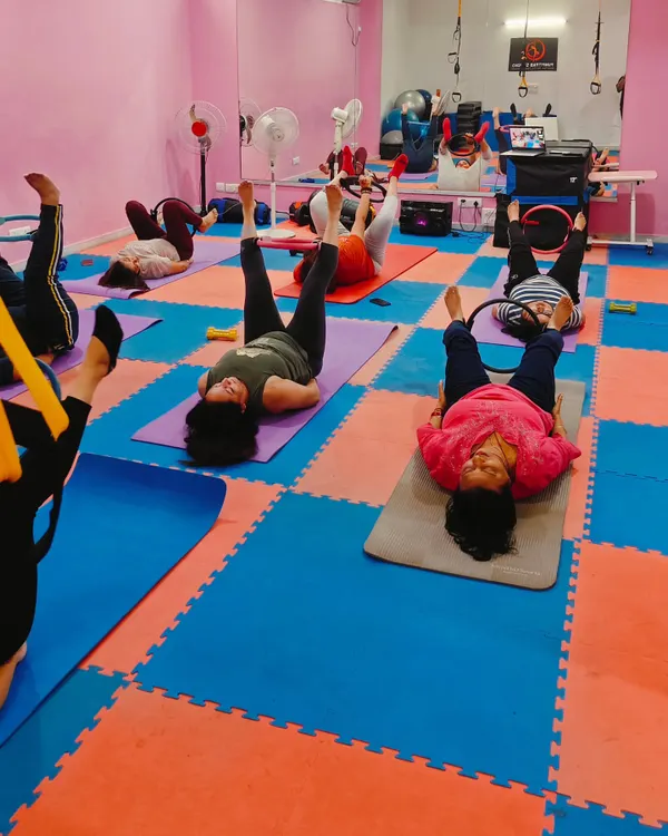 A glimpse into our women's Mat Pilates class, focusing on leg lifts and core engagement. These exercises are fantastic for building lower body and abdominal strength.