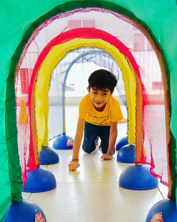 We turn exercise into an adventure, with colorful tunnels and creative challenges that kids love to explore. This is a great crawling exercise for building core strength and coordination.