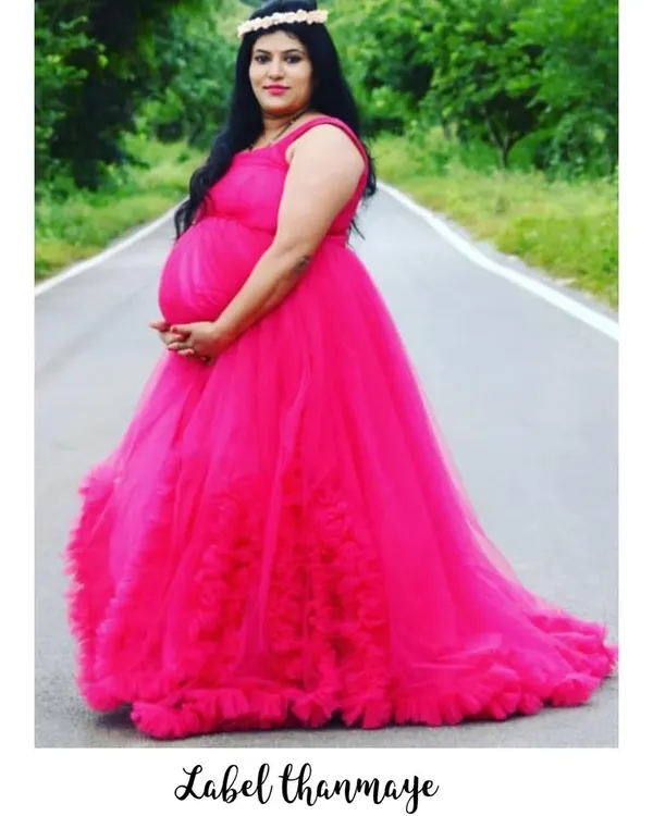 I designed this flowing pink maternity gown for a photoshoot. It's made with soft tulle to be comfortable and create a beautiful silhouette.