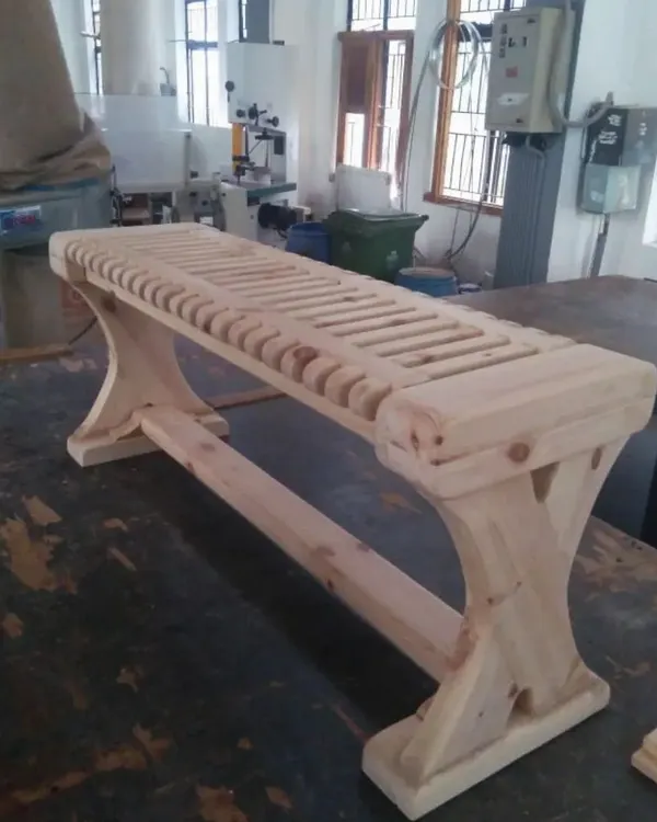 This elegant slatted bench, crafted by our students, showcases their ability to execute a design from concept to a fully functional, polished product.