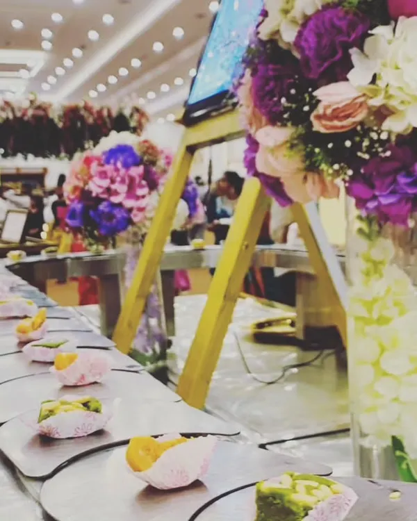 A close-up of our innovative conveyor belt, serving beautifully crafted desserts. This feature adds a dynamic and modern element to the dining experience.