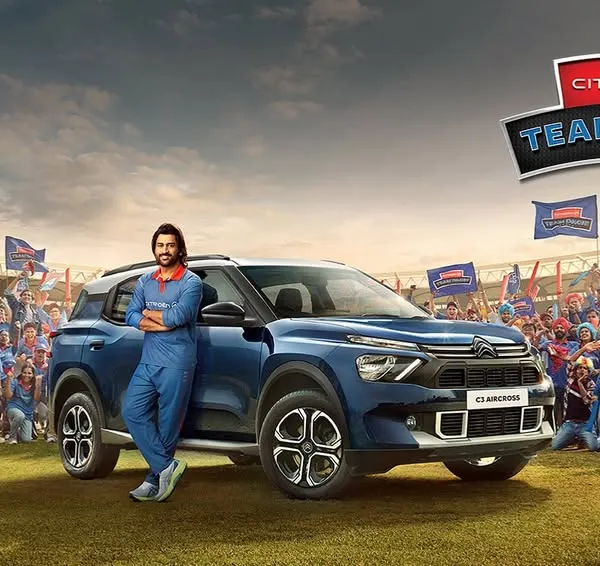 I had the opportunity to style the legendary MS Dhoni for this Citroen "Team Dhoni" ad campaign. The goal was a cool, approachable look that matched his personality, featuring a simple blue tracksuit for this shot in a stadium full of fans.