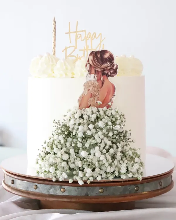 One of my most popular designs! This elegant cake features a beautiful illustration of a woman whose dress is made from a cascade of fresh baby's breath. It's so simple and so stunning.