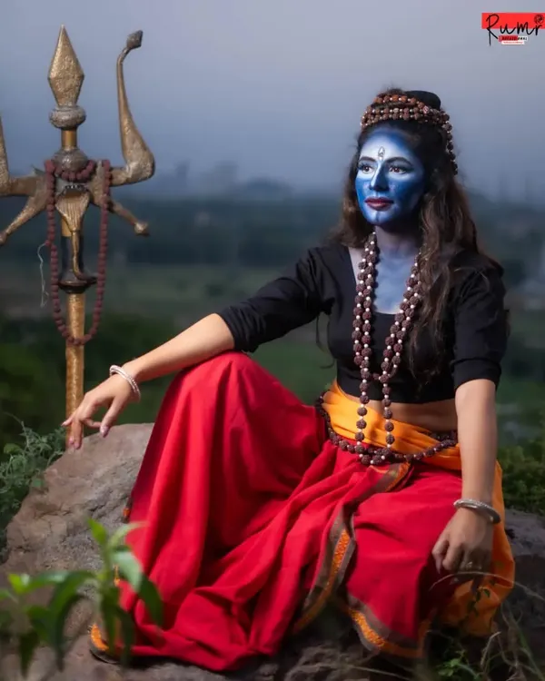 A full look at the cinematic Lord Shiva makeup. This style requires precise application of body paint, detailed line work for the third eye, and careful contouring to create a powerful, divine character.
