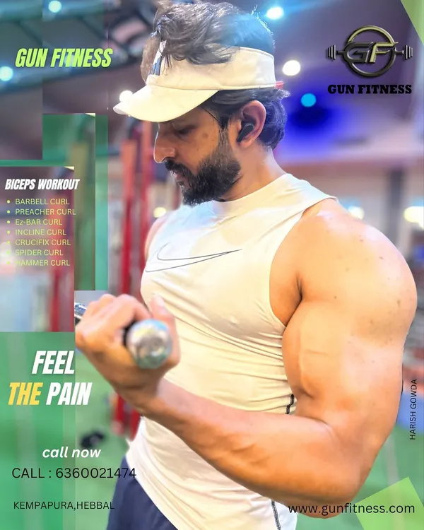 This member is focused on a bicep curl, a key exercise for building arm strength. My personal training includes guidance on specific routines like this for targeted muscle building.
