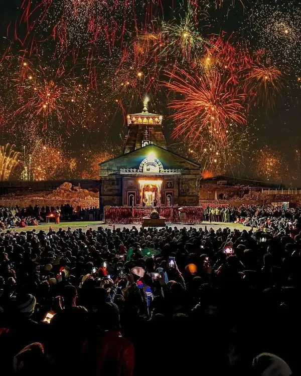 The Kedarnath Temple illuminated by a spectacular fireworks display. This shot captures a moment of divine celebration, blending the ancient temple's spiritual energy with a burst of modern festivity.