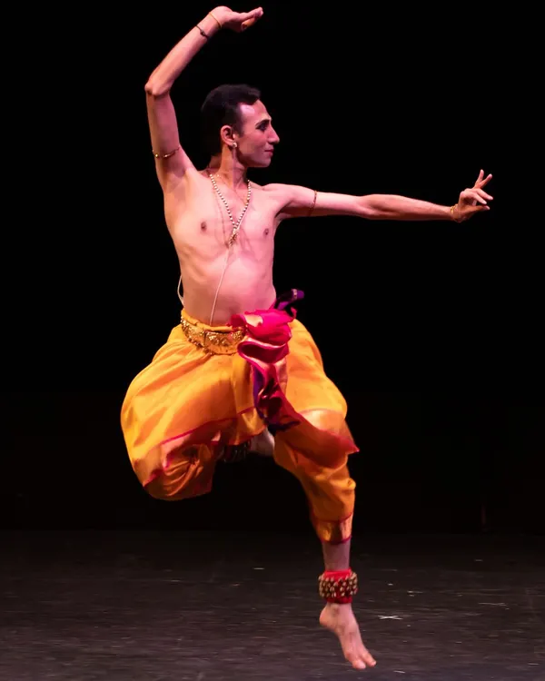 A moment of dynamic energy during a solo recital. This pose, captured mid-movement, reflects the powerful Nritta that forms the backbone of my performances, showcasing the athletic and graceful aspects of Bharatanatyam.