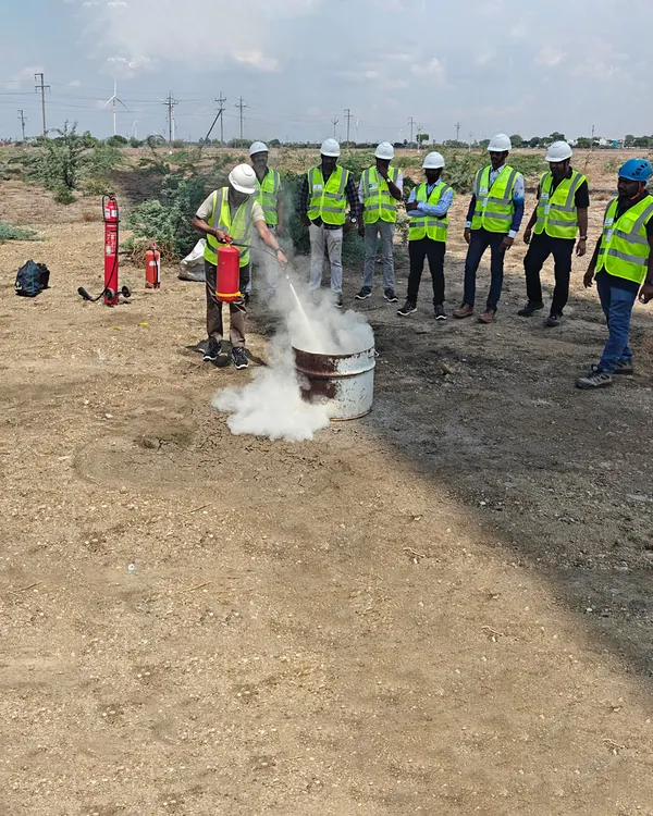 A practical fire safety drill in progress at one of our project sites. Our teams are regularly trained on emergency response procedures, including the correct use of fire extinguishers, to ensure they are equipped to handle any situation with confidence.