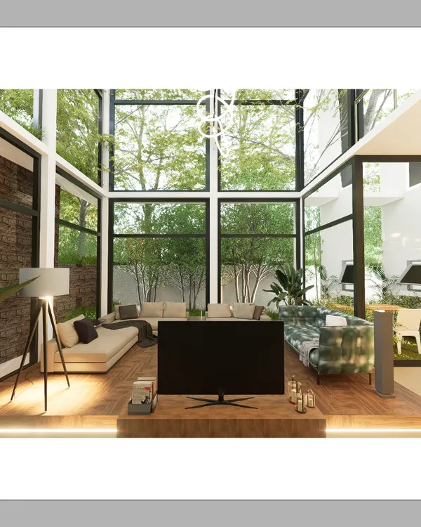 A daytime view of the living room in The Courtyard Glasshouse. The floor-to-ceiling windows flood the space with daylight and offer an uninterrupted view of the surrounding greenery, exemplifying my approach to biophilic design.