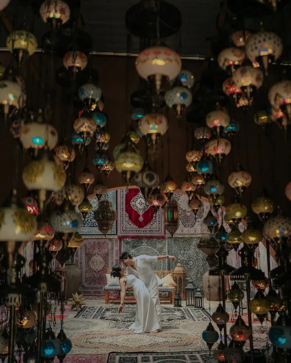 This is what dreams are made of. In a room full of a thousand lights, you are the only one I see. This cinematic pre-wedding shot at Carvan Filmcity captures the magic of finding your person in a world of possibilities.
