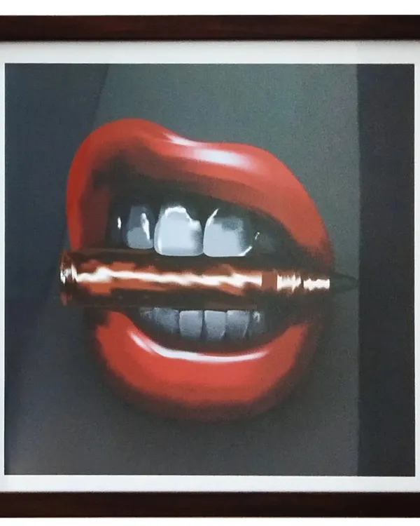 The framed version of my 'Biting the Bullet' digital painting. This piece, which represents facing hardship with courage, has been sold, but I can create similar conceptual art based on your ideas.
