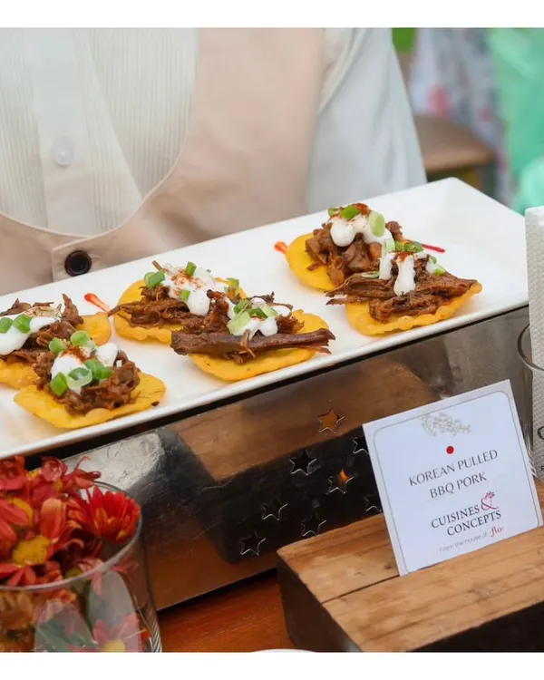 An elegant platter of Korean Pulled BBQ Pork served on crisp tortilla chips and topped with a cooling crema. This appetizer is a perfect example of our global fusion approach, combining bold international flavours in a single bite.