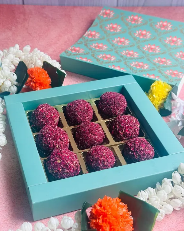 My Rose and Pistachio Truffles are made with rich white chocolate and come in this beautiful gift box, making them a perfect festive present.