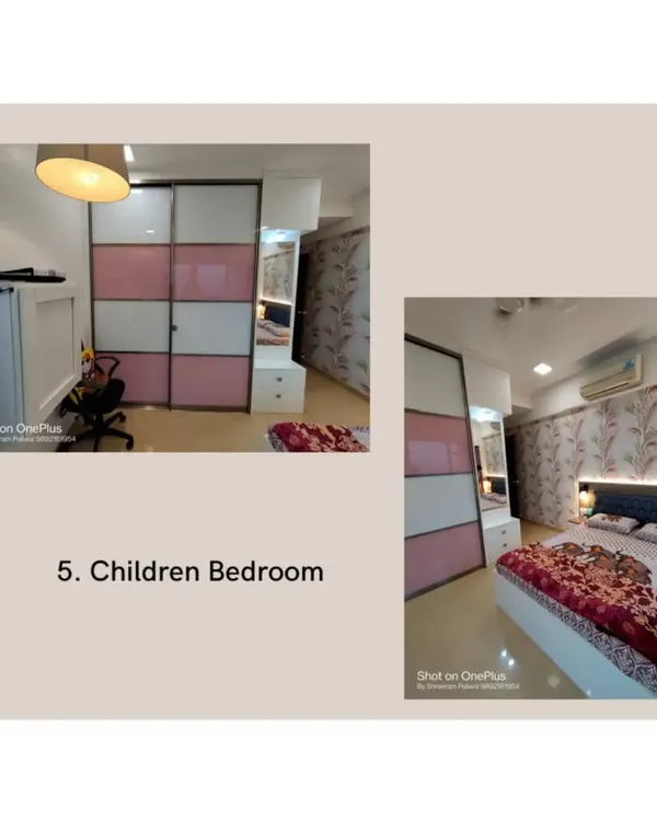 This is a children's bedroom I worked on, featuring a custom sliding wardrobe with pink and white panels. The design includes an attached dresser with a mirror to create a complete, functional unit.