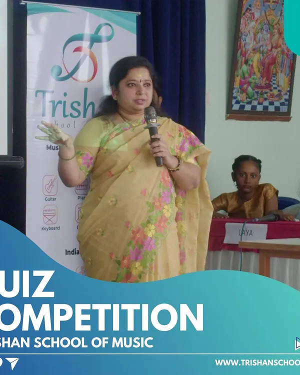 Our founder addressing students and parents at our Carnatic music quiz competition. We make learning music theory engaging and interactive.