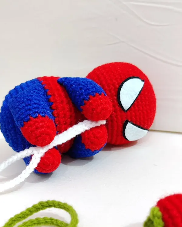 My chubbiesh Spiderman plushie getting ready to swing into action.