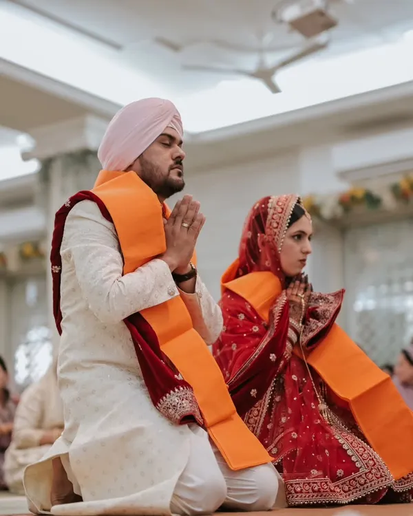 A moment of quiet devotion during a Sikh Anand Karaj ceremony. I focus on capturing the spiritual significance and serene beauty of such sacred rituals.