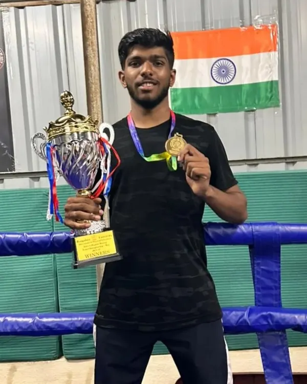 Proud moment for our gym. One of my top boxers with his trophy and gold medal from the Bengaluru University Inter-college Boxing Championship.