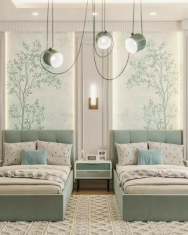 We designed this shared room with a calming mint green palette and nature-inspired wallpaper. The matching twin beds and symmetrical layout create a harmonious space, while the modern pendant lights add a stylish touch.