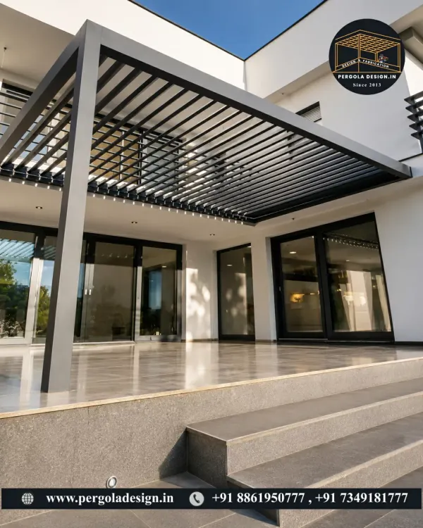 This sleek, louvered aluminum pergola extends the living space of this modern home, creating a seamless indoor-outdoor transition. The adjustable louvers offer control over sunlight and airflow, making the patio usable in any weather.